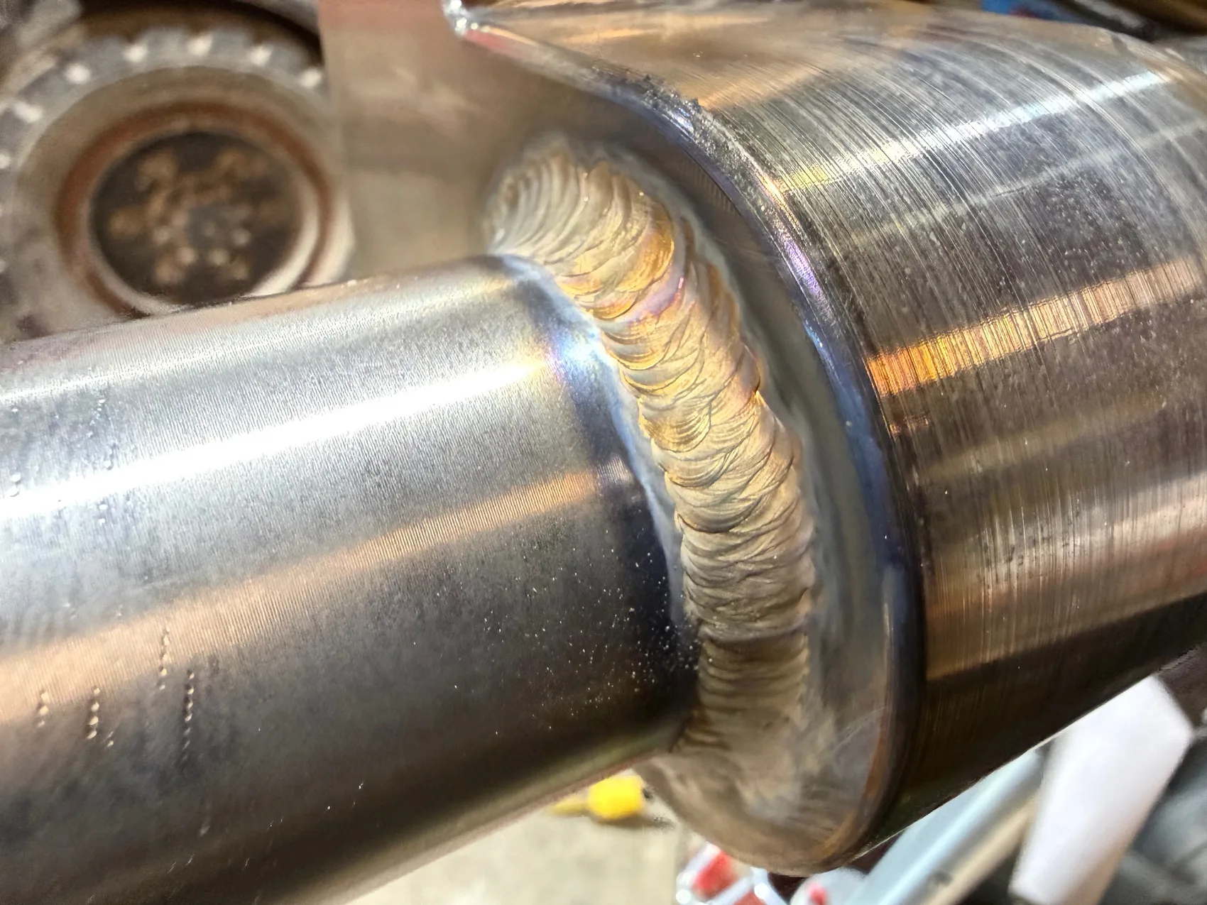 Color-tint sanitary TIG weld on a polished food-grade stainless shaft by Sons of Thunder Welding