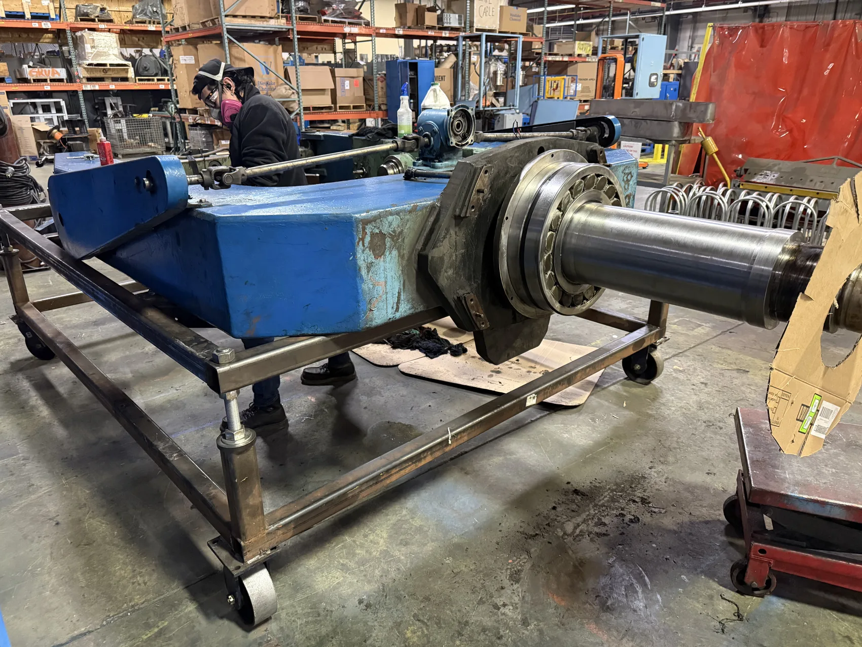 Heavy rotating machine cradle staged for structural weld repair by Sons of Thunder Welding